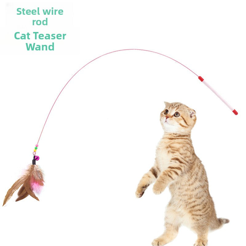 A kitten standing on its hind legs playing with a steel wire cat teaser wand that has a feather tassel, on a white background with text reading 'Steel wire rod Cat Teaser Wand'.